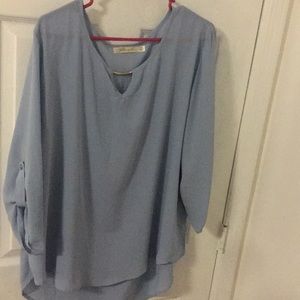 A light blue blouse